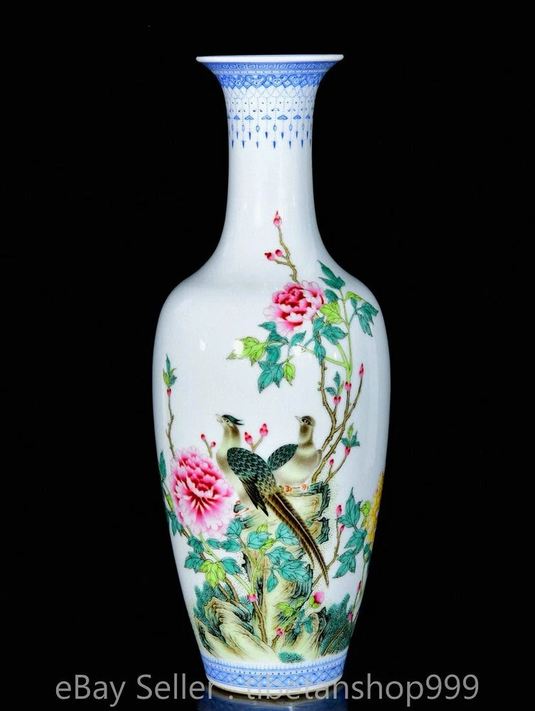 Porcelain vase with peony flowers and a bird, white body with blue rim
