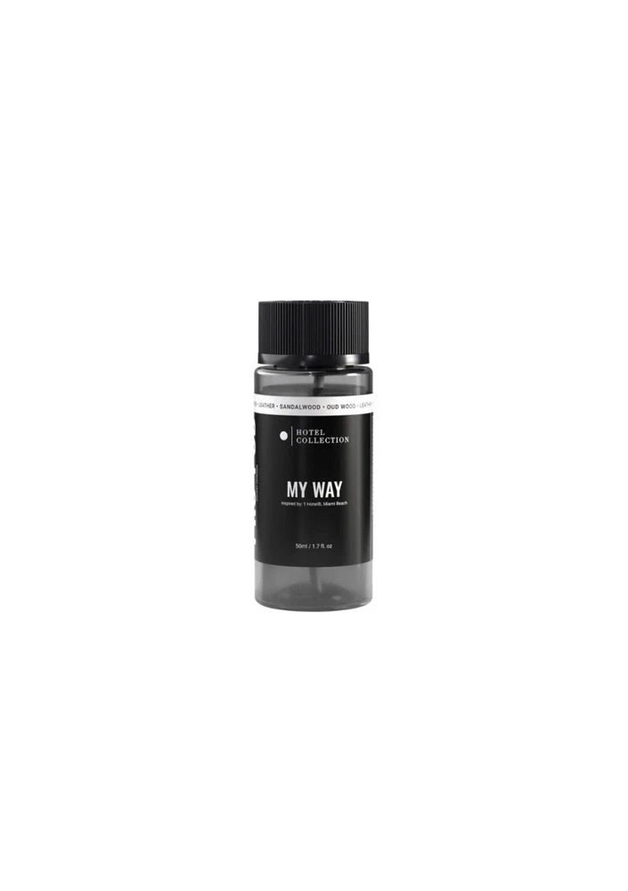 Dark glass essential oil bottle with black cap, labeled "MY WAY".