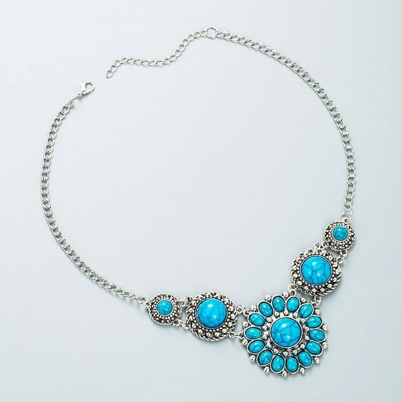Turquoise and silver sunflower necklace with beaded cabochon floral pendant