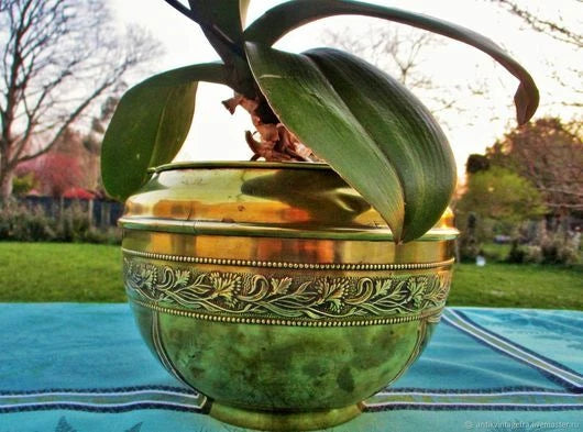 Antique brass flower planter with engraved band and domed top