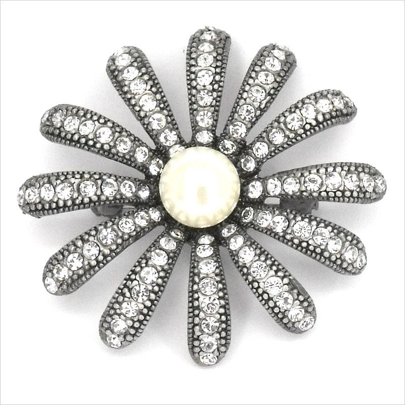 Vintage sunflower brooch pin with white faux pearl center and clear crystal rhinestone petals