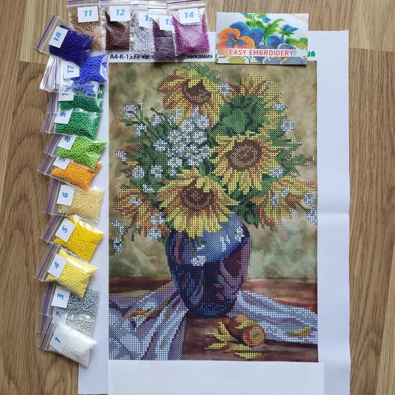 Bead embroidery kit with printed sunflower flower canvas and assorted numbered bead colors