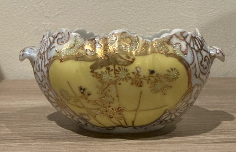 Gilded serving bowl with lotus flower and lily pad relief, cream and gold finish