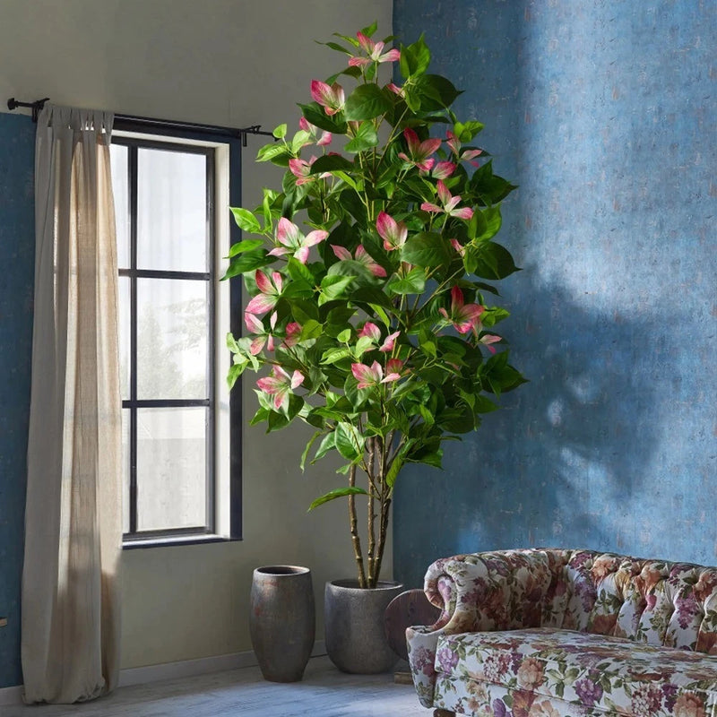 Artificial ficus tree with green leaves and pink flower clusters in a pot