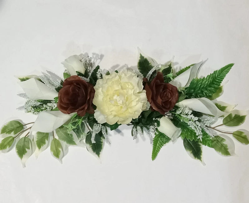 Brown rose and cream peony silk flower swag with green leaves for wall or door arch