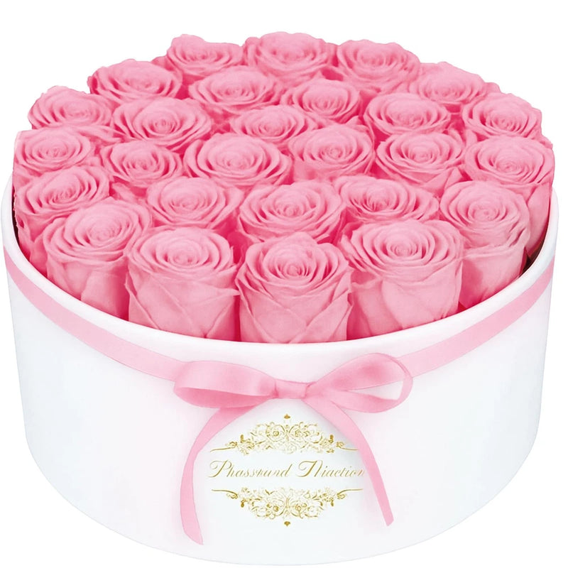 Round gift box with 17 pink preserved roses and pink ribbon
