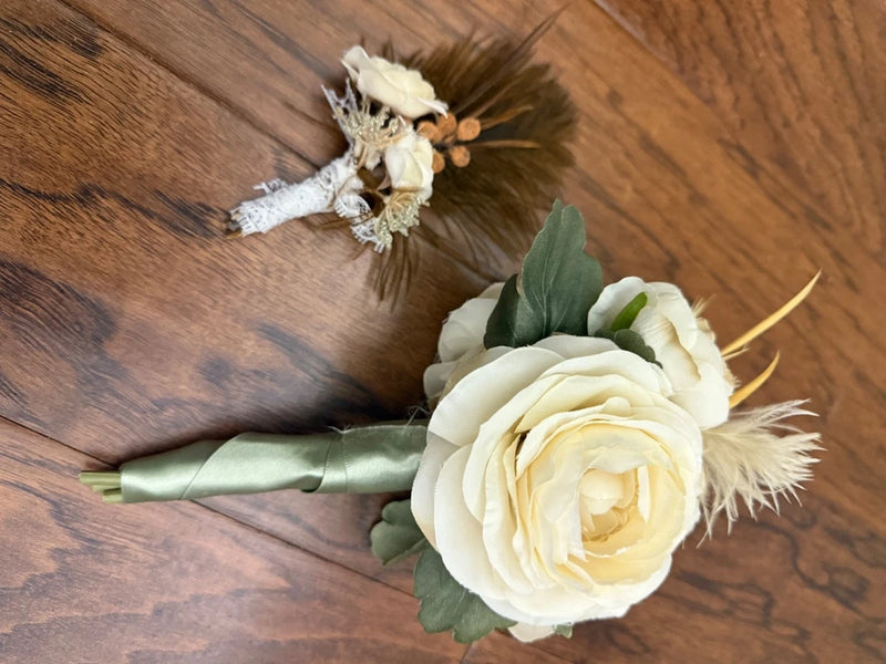 Handmade white rose boutonniere with sage leaves and green satin ribbon tail