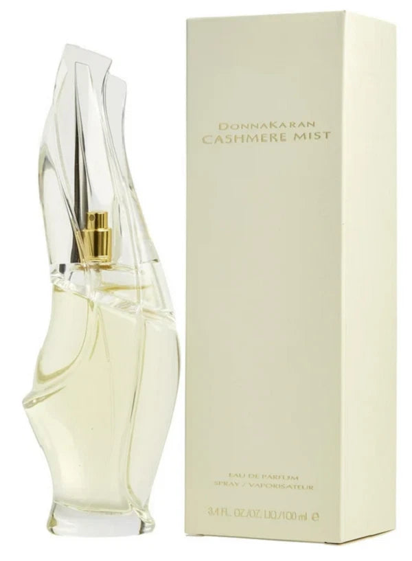 Donna Karan Cashmere Mist eau de parfum set: clear bottle with gold sprayer, cream box