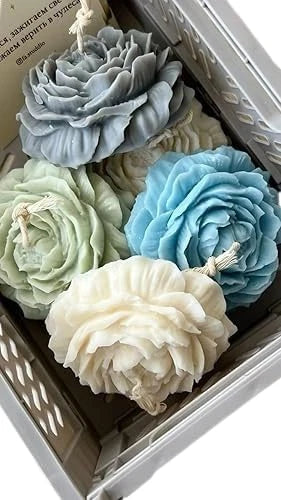 Peony flower candles with ridged petals in gray, cream, and blue