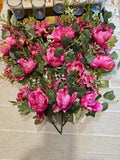 Pink peony floral pick decor with green leaves and multiple flower blooms