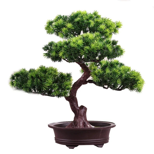 Artificial potted bonsai tree with green needle-like leaves in dark brown pot