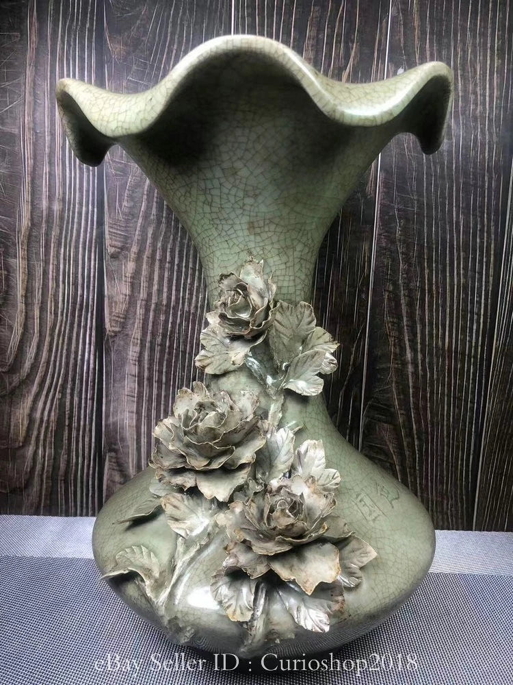 Celadon porcelain peony-relief vase with bulbous body and sculpted flower detail