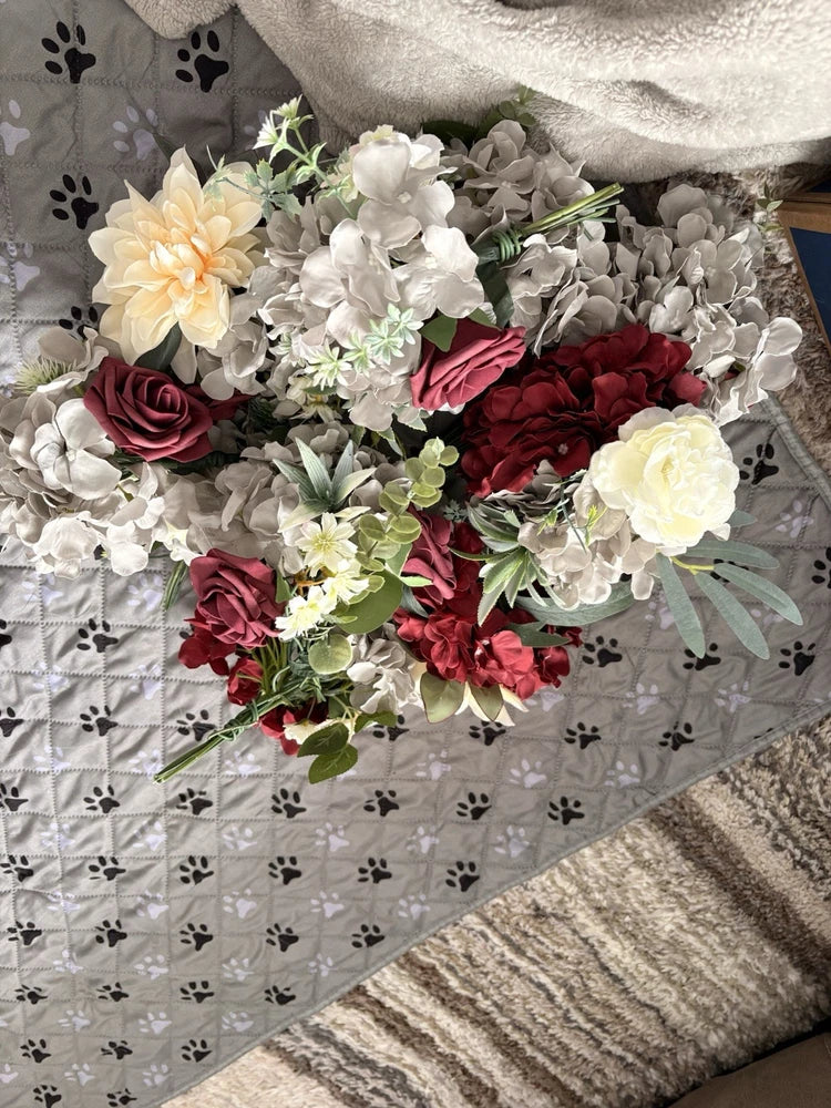 Variety flower bouquet with burgundy, gray and champagne blooms on green stems