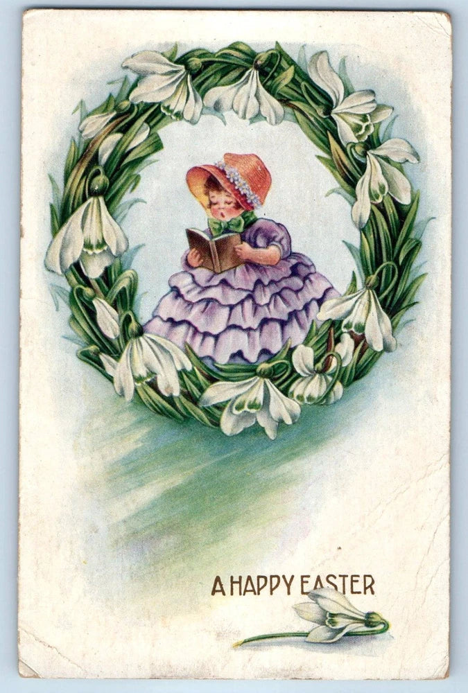 Vintage Easter postcard with a girl in a purple ruffled dress in a lily wreath