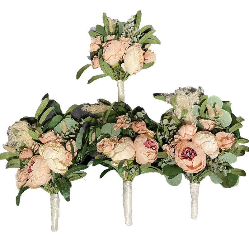 Set of faux fall bouquets with peach roses and green foliage, tied ribbon stems