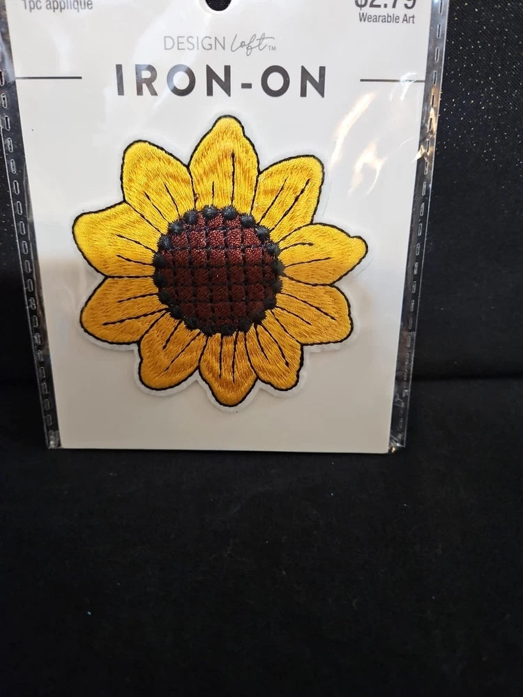 Sunflower iron-on patch with yellow petals and dark embroidered center