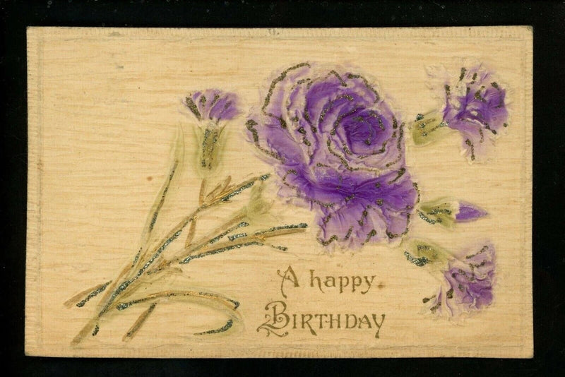 Vintage birthday postcard with embossed purple carnations and Happy Birthday text
