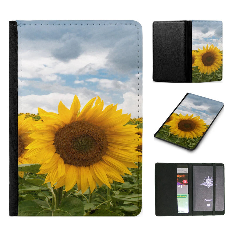 Sunflower passport itinerary organizer with black faux-leather cover and interior card slots