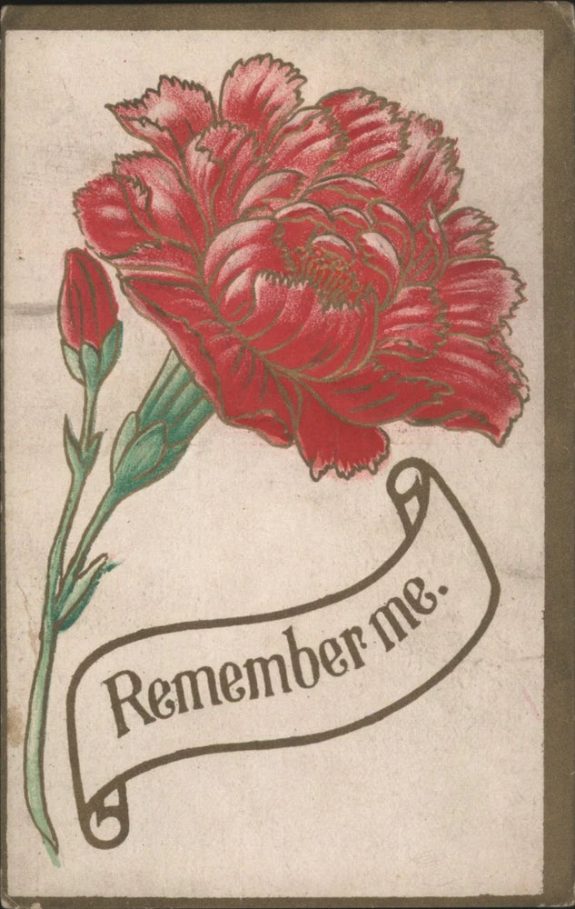 Antique vintage postcard with red carnation flower and “Remember me” ribbon scroll