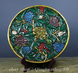 Round green lacquerware tray with raised peony floral relief and gold rim