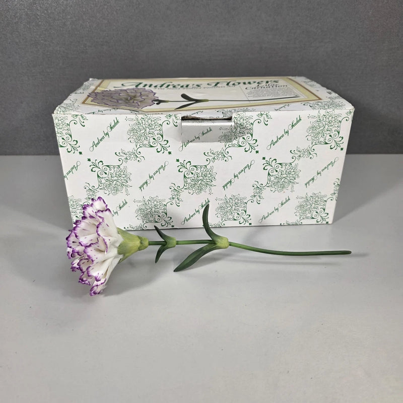 Hand-painted porcelain carnation flower with lilac and white petals and green leaves