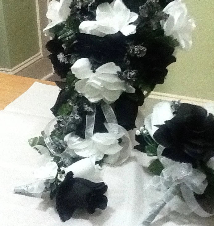 Black and white artificial flower bouquet with matching boutonniere and toss flowers
