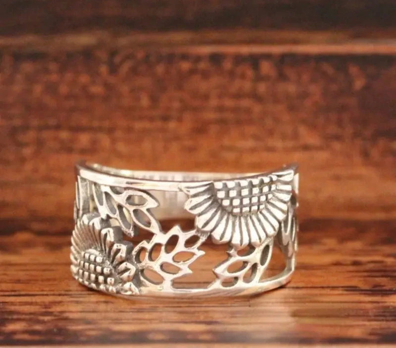 Sterling silver open-work eternity stacking ring with floral and leaf cutouts