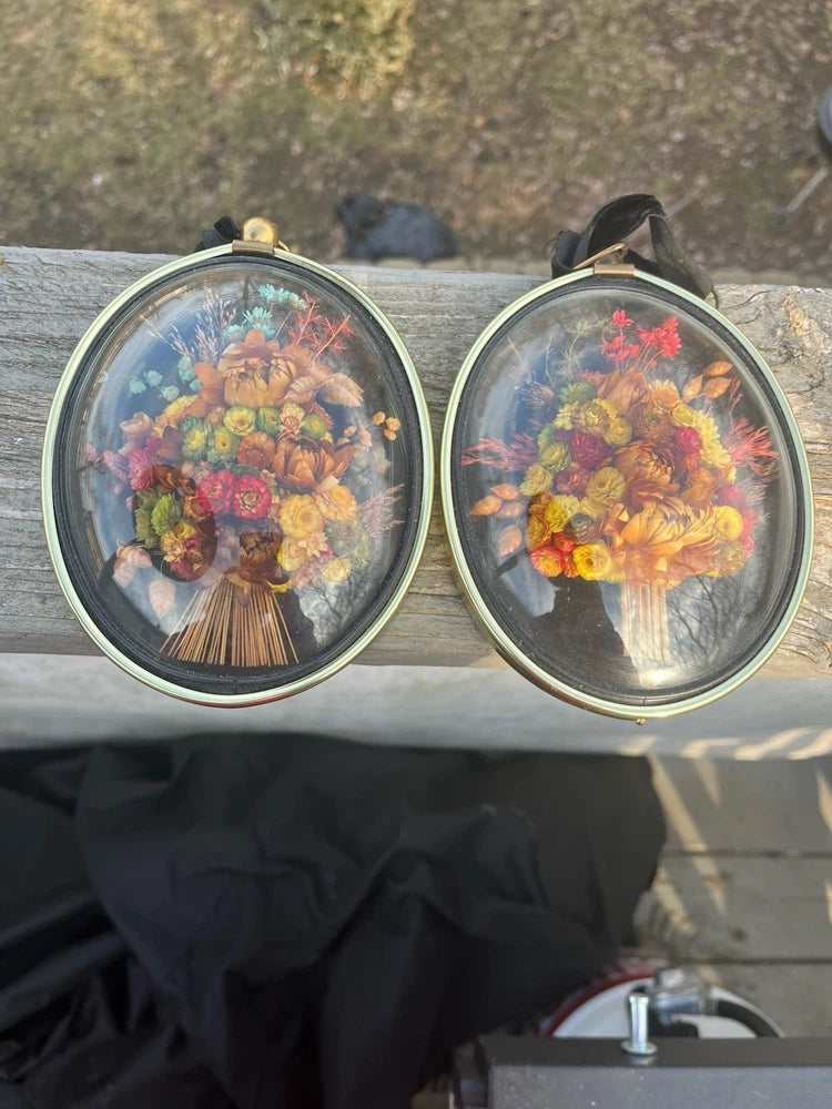 Set of 2 oval domed glass frames with multicolor dried flower bouquets, wall hanging