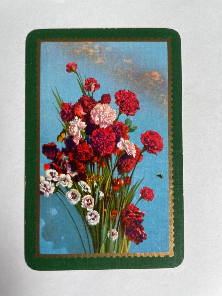 Vintage playing swap card with red flowers bouquet, green border and small bee at center