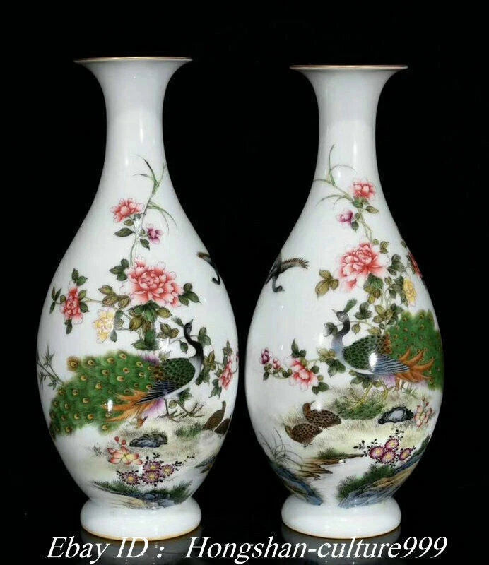 Porcelain vase pair with peony blooms and peacock bird motifs, white ceramic