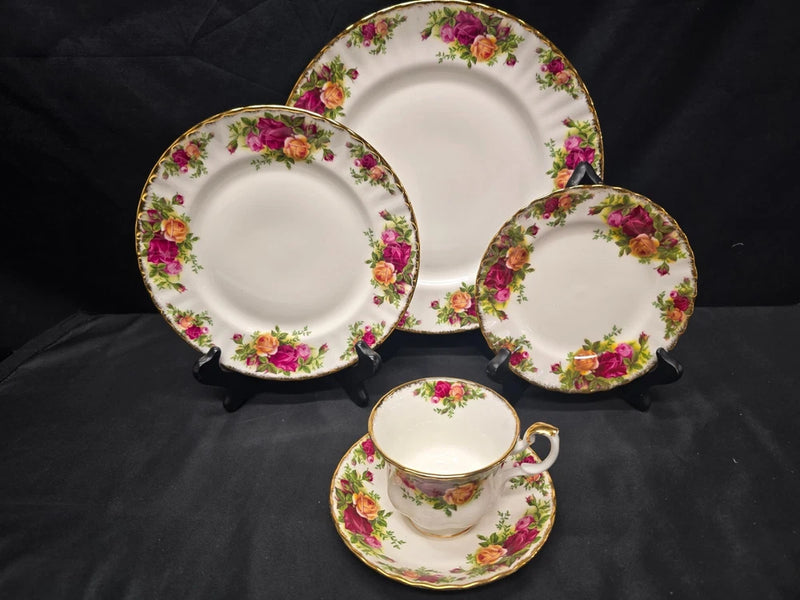 Royal Albert Old Country Roses 5-piece place setting: two plates, cup, saucer with floral rim