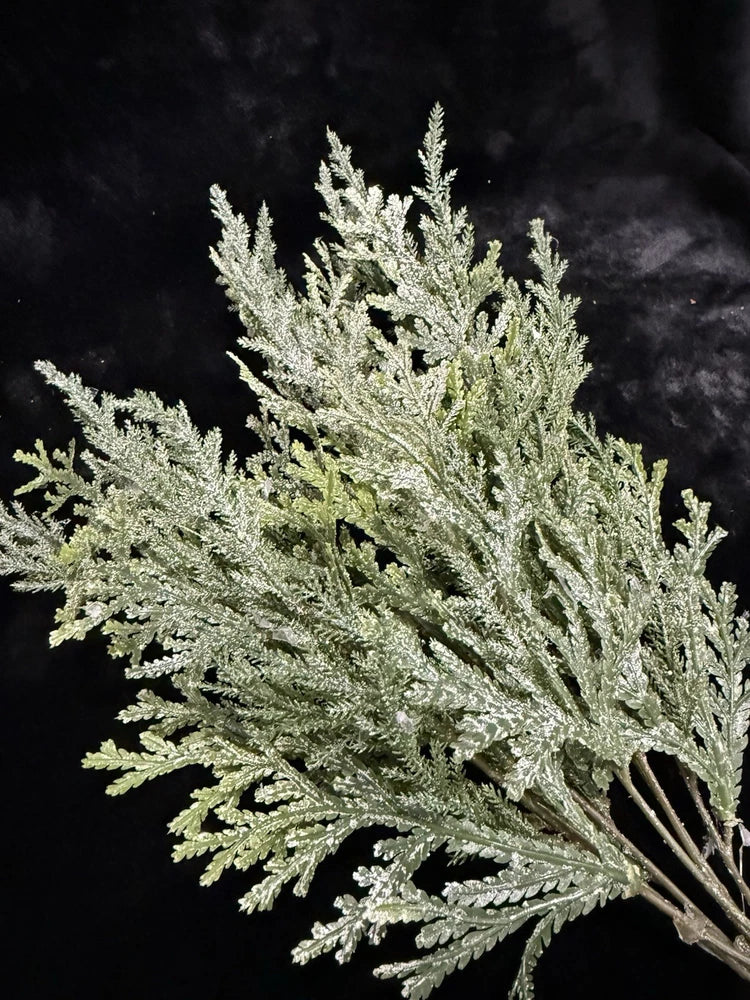 Artificial frosted cedar branch pick with silver-tinted needles, green stem