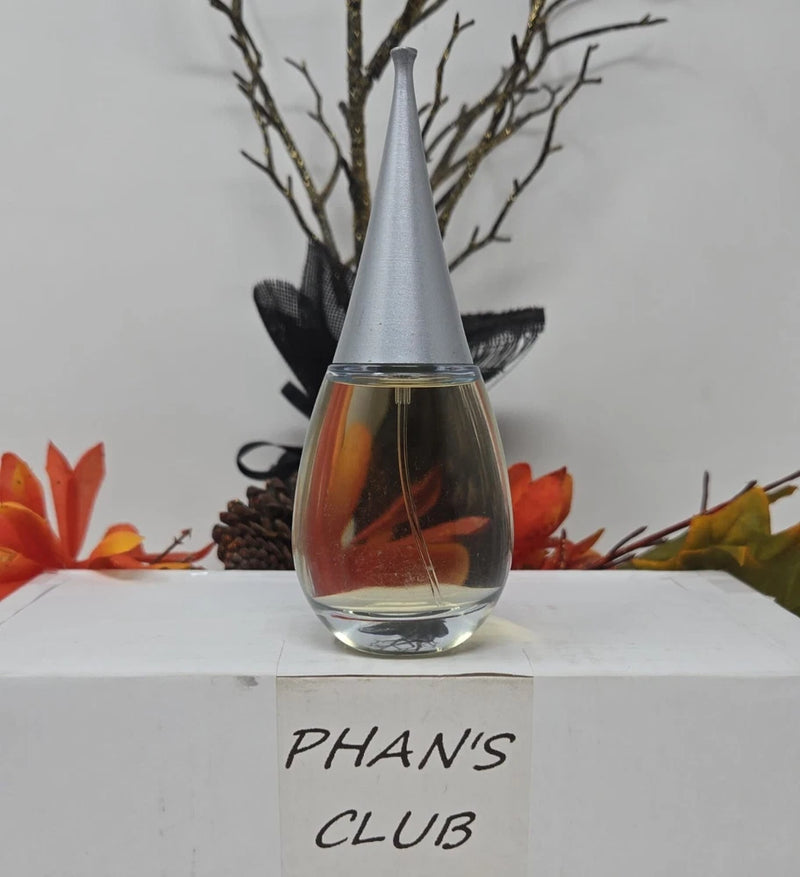 Amber glass perfume bottle with silver conical cap