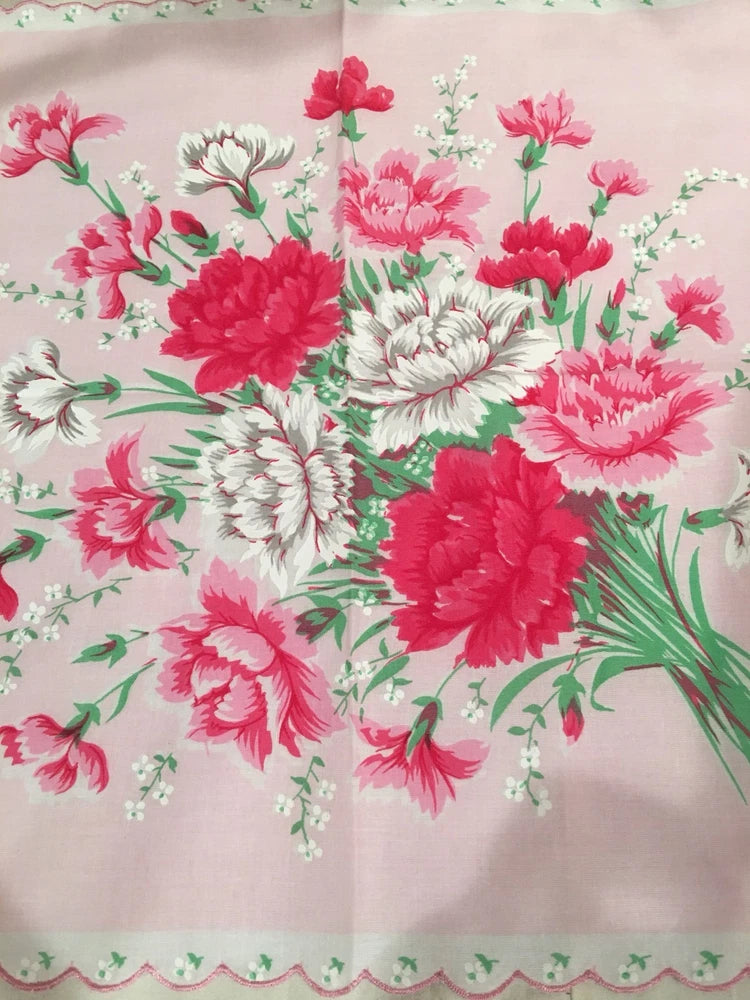 Pink floral handkerchief with carnation bouquet print and scalloped edge