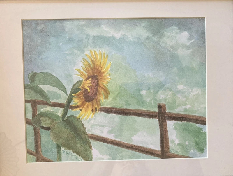 Sunflower fence watercolor print with yellow bloom, green leaves, and brown wooden fence