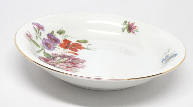 Floral ceramic soup bowl with colorful carnation print and gold rim