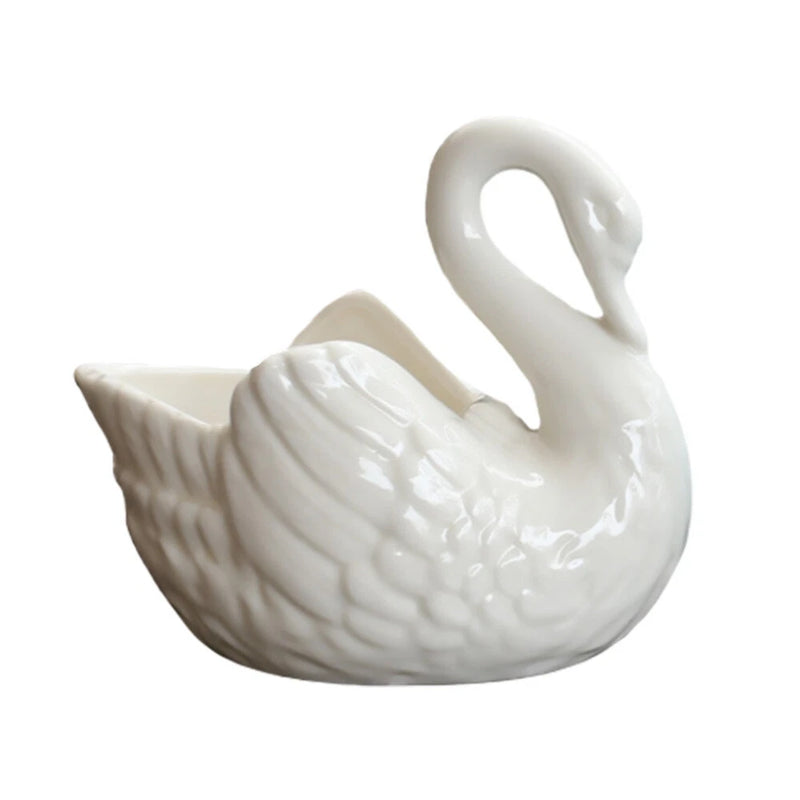 White swan-shaped succulent flowerpot planter with open wing design