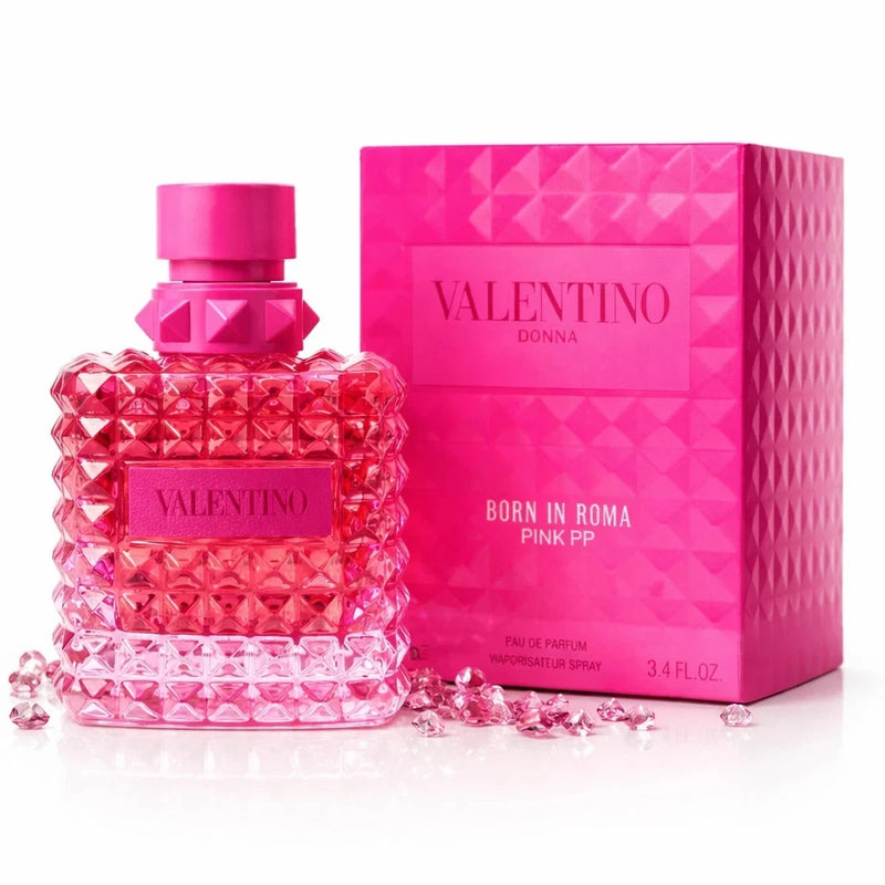 Pink perfume spray bottle with textured glass, and matching Valentino gift box