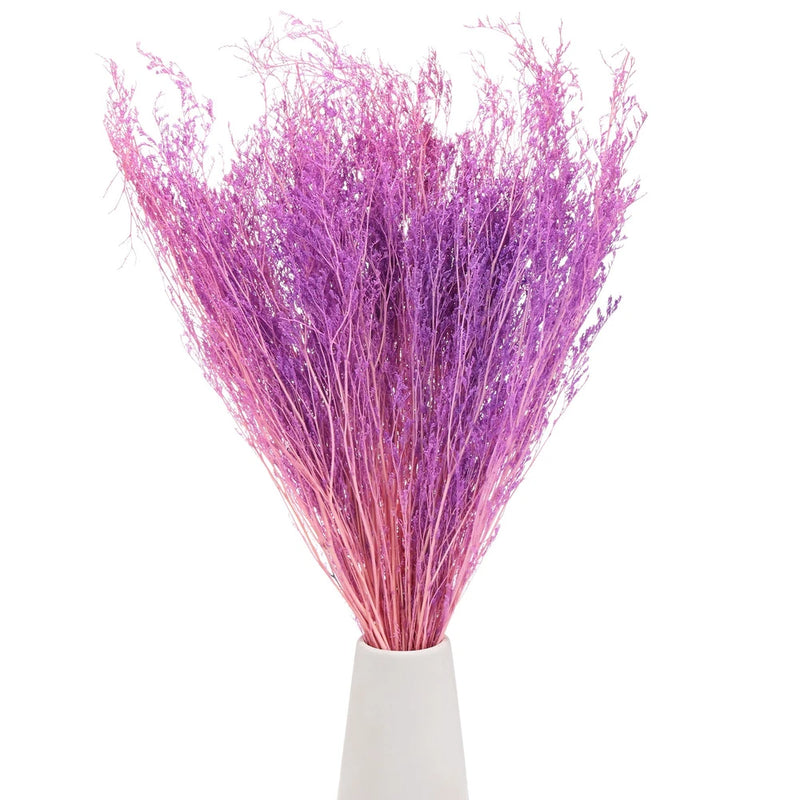 Dried flower bouquet of slender limonium stems, pink-purple, bundled