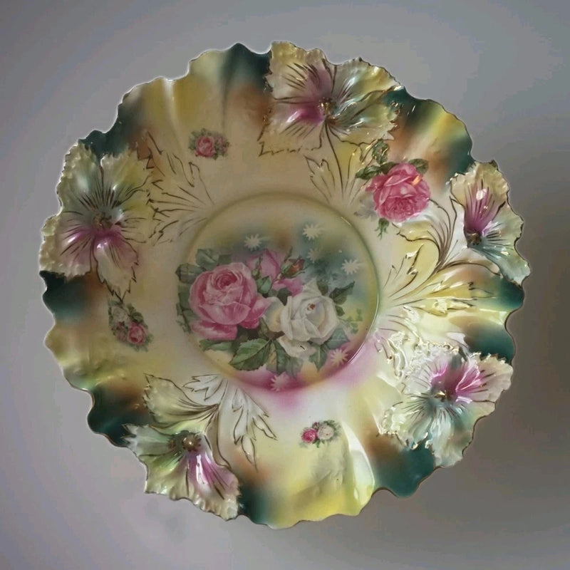 Scalloped porcelain floral bowl with pink roses and gold accents, decorative rim