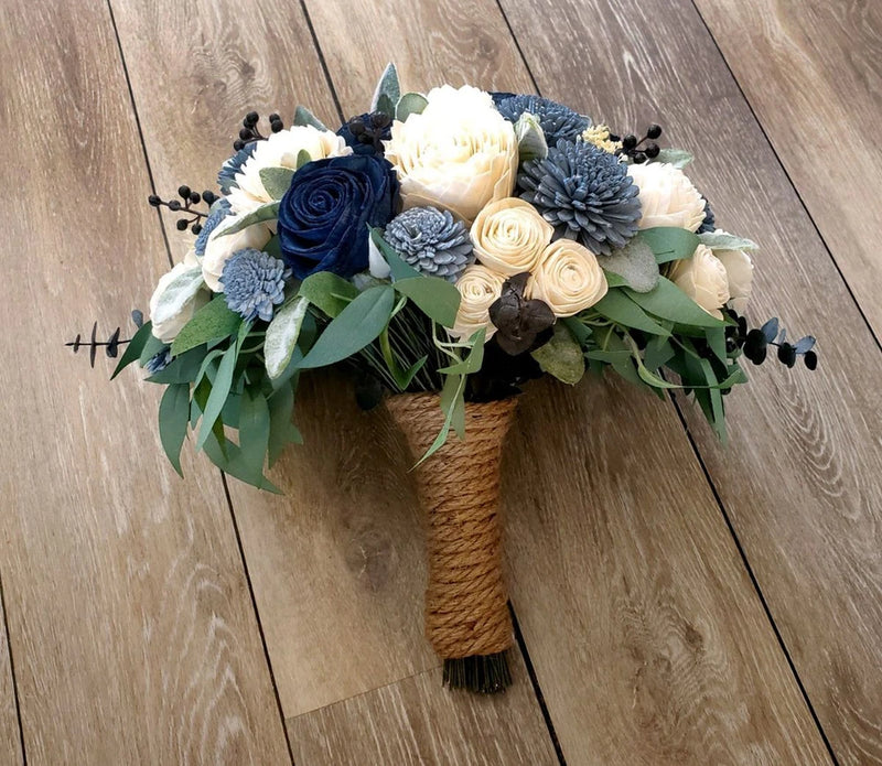 Artificial bridal bouquet with ivory and dusty blue flowers and burlap rope handle