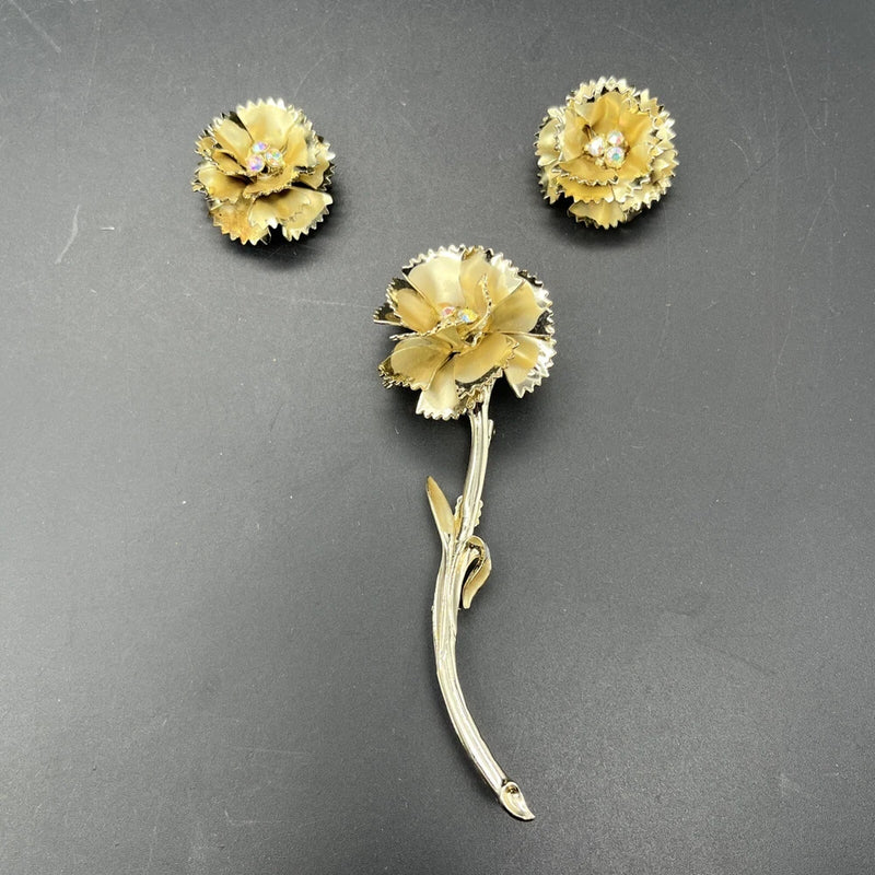 Gold-tone carnation flower brooch with rhinestones and matching stud earrings