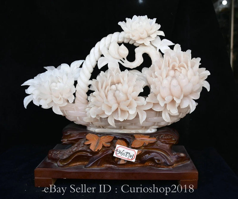 White peony flower basket jade carving sculpture on dark wooden base