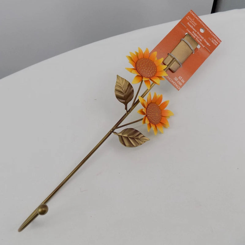Bronze wreath hanger stake with orange sunflower and leaf accents, 15 in long