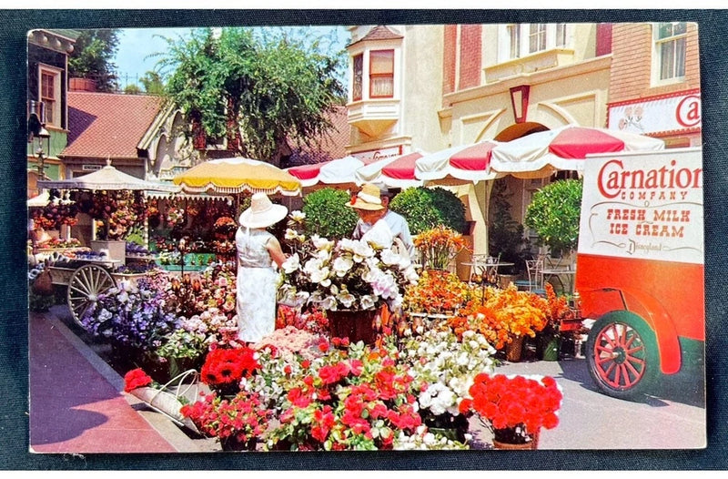 Vintage postcard with flower market scene and Carnation ice cream truck