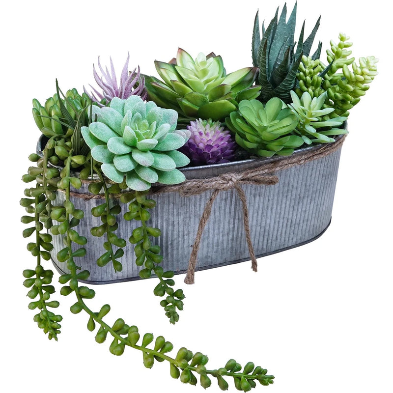 Artificial succulent arrangement in gray rustic planter with trailing green and purple leaves