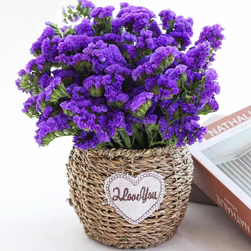 Purple dried sea lavender bouquet in woven basket with heart tag