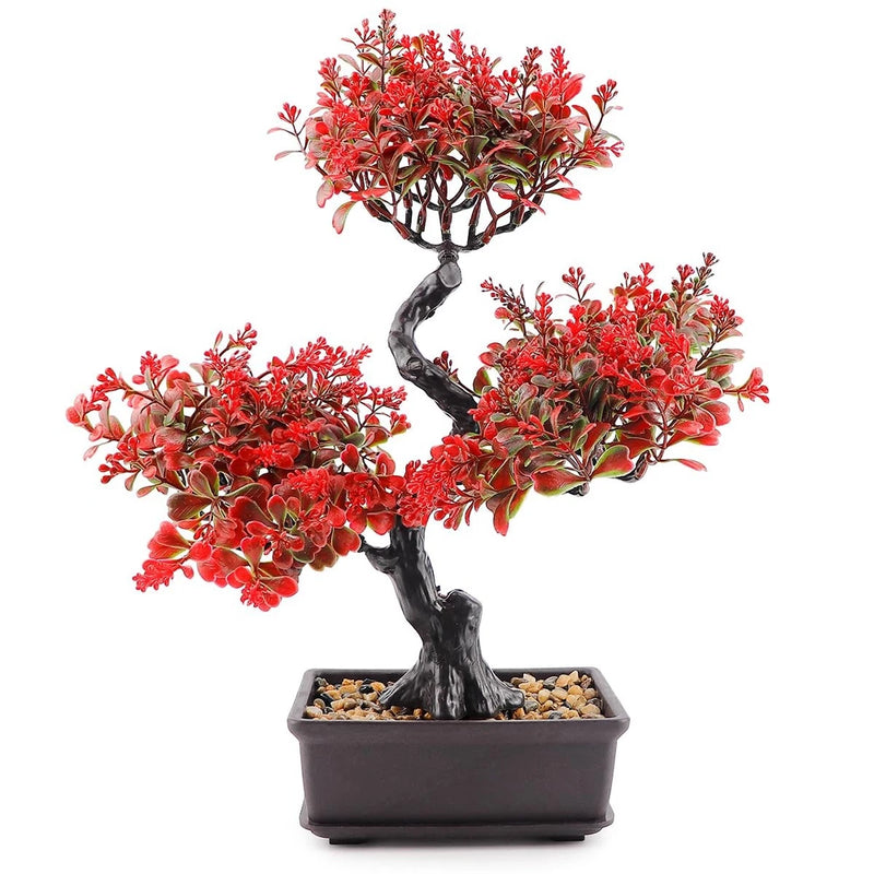 Artificial bonsai tree with red plastic foliage, black trunk, in square pot