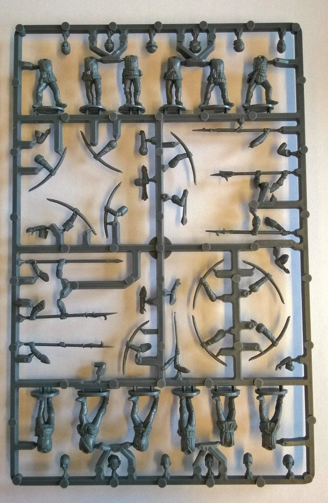 Plastic infantry miniature sprue with multiple medieval soldiers and weapons, gray