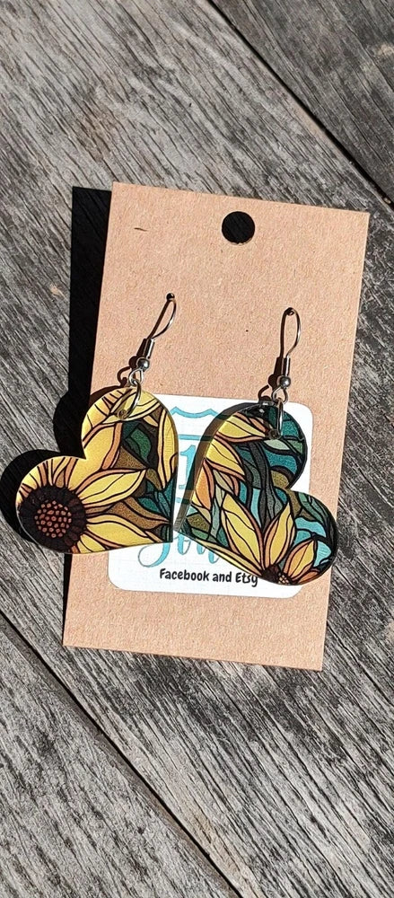 Stained glass style sunflower dangle earrings with colorful leaf pattern and hooks